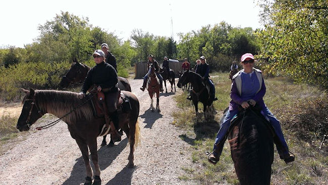 Group of horseback riders enjoying horseback riding atLake Grapevine on Trophy Club equestrian trail