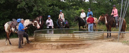 By windmill stock tank at LBJ Grassland - CTETA ride 061210